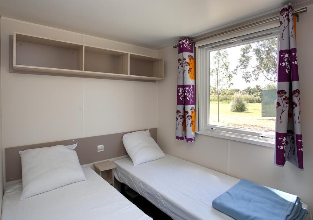 Camping Miami Plage Hotel Poggio Mezzana Værelse billede